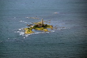 Lighthouse in the Kalmar strait between mainland Sweden and the island of Oland Lighthouse in the Kalmar strait between mainland Sweden and the island of Oland