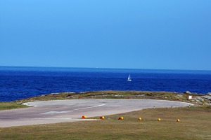 Runway 14 at St Mary leads to the cliffs over the sea