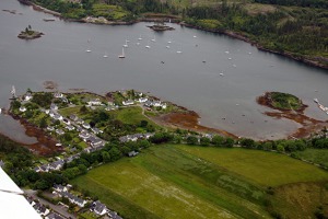 Plockton town and bay. The area is kept warme by the Gulf of Mexico