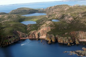 Coast of Muckle Roe island, the Shetlands