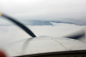 Between cloud layers - flight from Orkney islands to Faroe Islands