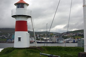 Lighthouse at the port of Thornshaven, Faroe islands