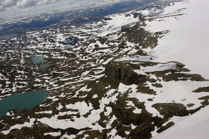 Hardanger-jokulen glacier flowing down the valley