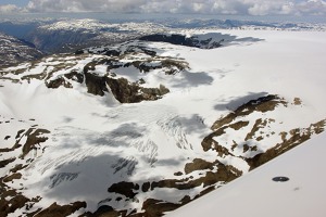 Hardanger-jokulen glacier flowing down the valley