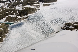Hardanger-jokulen glacier flowing down the valley